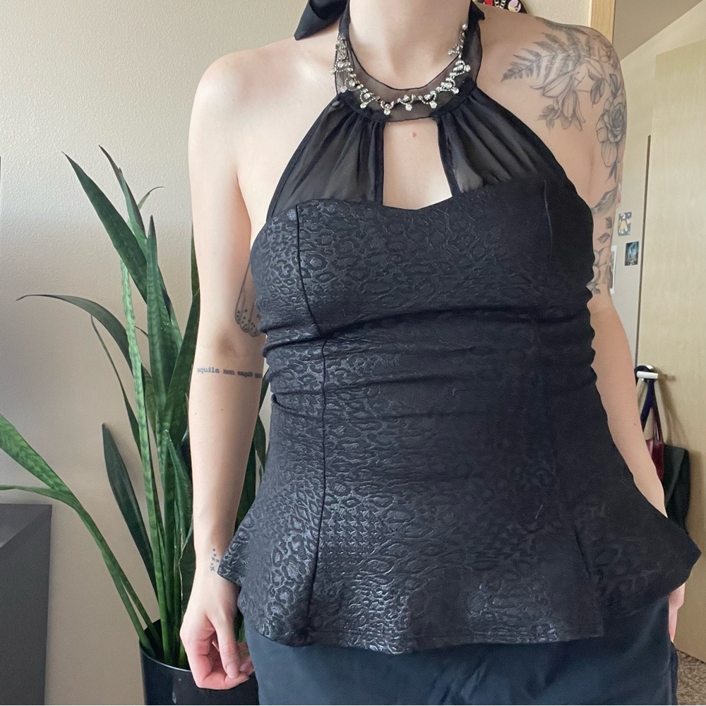 Statement necklace peplum top